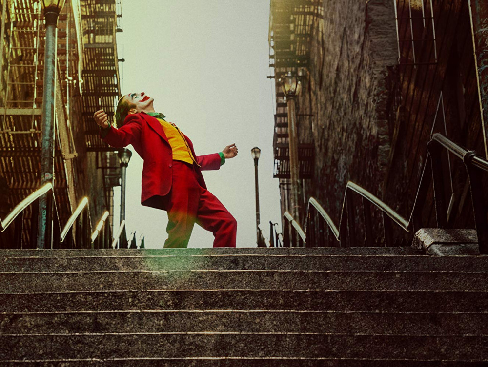 Joaquin Phoenix on dancing stairs (Warner Bros. Pictures)