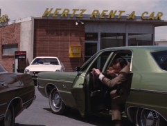 In front of Hertz a Rent Car