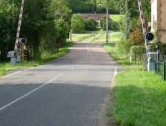 In front of the railway crossing