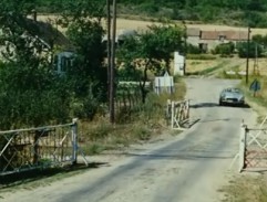 In front of the railway crossing